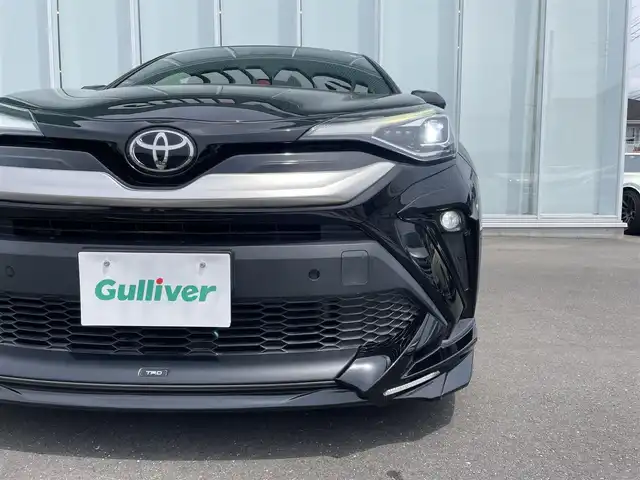 トヨタ Ｃ－ＨＲ G－T 神奈川県 2020(令2)年 5万km ブラックマイカ ９インチ純正ナビ　/バックカメラ　/ＴＲＤフルエアロ（フロントスポイラーLED付）/TRDトランクスポイラー/ドレスアップマフラー/TRDフロントバンパーガーニッシュ/TRDフォグガーニッシュ/Ｂｌｕｅｔｏｏｔｈ　ＤＶＤ　ＣＤ　/フルセグＴＶ　/ＥＴＣ２．０　/シートヒーター　/ＬＥＤヘッドライト　/フォグランプ　/ローダウンスプリング　/スマートキー/社外ドリンクホルダー/トヨタセーフティーセンス
