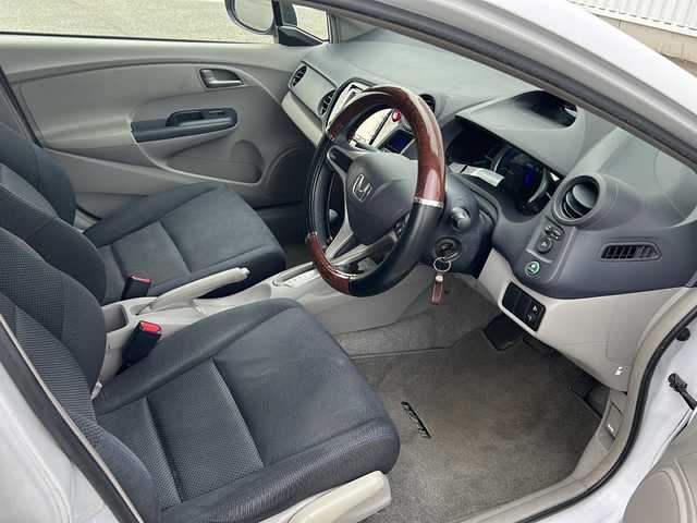 ホンダ インサイト G 愛媛県 2009(平21)年 16.7万km スペクトラムホワイトパール 純正ナビ/ETC/純正フロアマット/ファブリックシート/ワンセグTV/CDチェンジャー/パワーウィンドウ/パワーステアリング/ABS/リモコンキー