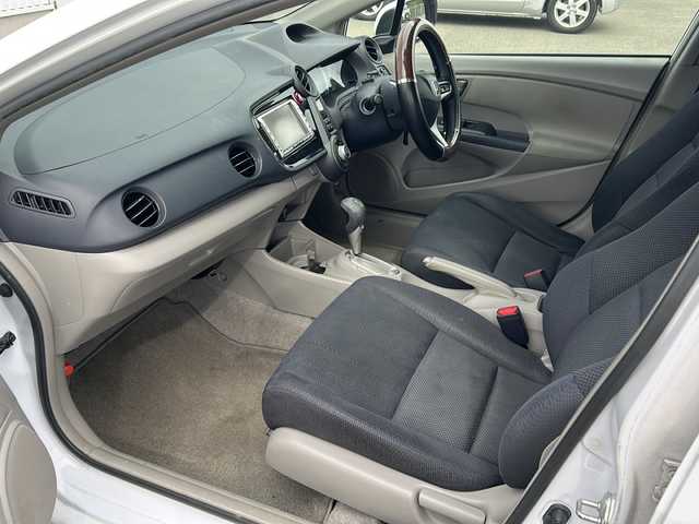 ホンダ インサイト G 愛媛県 2009(平21)年 16.7万km スペクトラムホワイトパール 純正ナビ/ETC/純正フロアマット/ファブリックシート/ワンセグTV/CDチェンジャー/パワーウィンドウ/パワーステアリング/ABS/リモコンキー