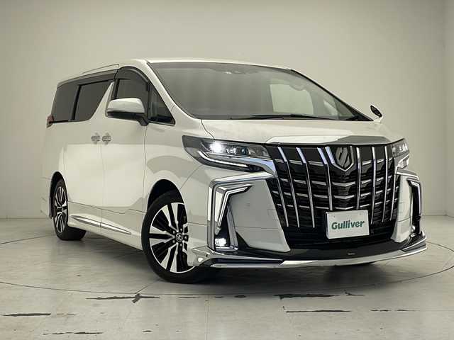 トヨタ アルファード S Cパッケージ 沖縄県 2023(令5)年 2.5万km ホワイトパールクリスタルシャイン 純正ナビ/（フルセグＴＶ、ＣＤ、ＤＶＤ、Ｂｌｕｅｔｏｏｔｈ）/バックカメラ/純正フリップダウンモニター/ＥＴＣ/前後ドライブレコーダー/クルーズコントロール/両側パワースライドドア/モデリスタエアロ/ＬＥＤヘッドライト/前後コーナーセンサー/オートライト/プッシュスタート　/スマートキー/シートヒーター　/エアシート/ステアリングスイッチ/サンシェード/純正アルミホイール