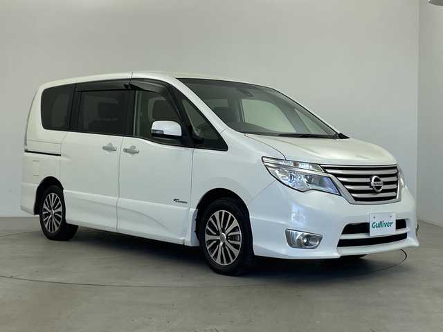 日産 セレナ HWS S HV Vセレ +Sefty 鹿児島県 2015(平27)年 6万km ブリリアントホワイトパール 純正８インチナビ　/（フルセグ/Bluetooth/CD/DVD/AM/FM)　/フリップダウンモニター　/両側パワースライドドア　/クルーズコントロール　/ビルドインＥＴＣ　/レーンディパーチャーアラート　/電動格納ミラー/オートハイビーム/LEDヘッドライト　/プッシュスタートボタン　/スペアキー有