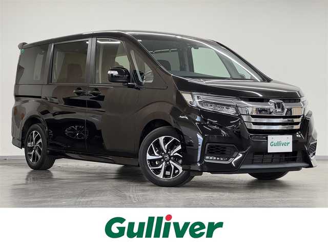 ホンダ ステップワゴン スパーダ ホンダセンシング 千葉県 2020(令2)年 4.7万km プレミアムスパークルブラックパール ガソリンターボ/FF/MTモード付インパネCVT/純正 9インチナビ VXM-207VFNi/（CD/DVD/RADIO/TV/SD/MUSIC RACK/USB/iPod/Bluetooth/CarPlay）/純正 9インチ 後席フリップダウンモニター VM-155N/バックカメラ/両側パワースライドドア/ドライブレコーダー 前後/ビルトイン ETC2.0/Honda SENSING/・衝突軽減ブレーキ［CMBS］/・車線維持支援システム［LKAS］/・路外逸脱抑制機能/・アダプティブクルーズコントロール［ACC］/・標識認識機能/・先行車発進お知らせ機能/装備/・【OP】わくわくゲート/・左右独立オートエアコン/・オートライト/・LEDヘッドライト/・LEDフロントフォグライト/・パドルシフト/・ステアリングリモコン/・純正16inAW/・保/取/・予備スマートキーx1
