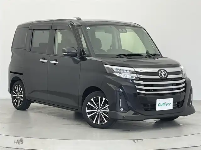 トヨタ ルーミー カスタムG－T 宮城県 2021(令3)年 0.9万km ブラックマイカメタリック 両側パワースライドドア/バックカメラ/メモリナビ/フルセグTV/Bluetooth/USB入力端子/DVD再生機能/ETC/Wi-Fi/レーダークルーズコントロール/シートヒーター/衝突被害軽減システム/レーンキープアシスト/プッシュスタート/スマートキー/オートライト/オートマチックハイビーム/LEDヘッドライト/ドアバイザー/純正フロアマット/純正15インチアルミホイール