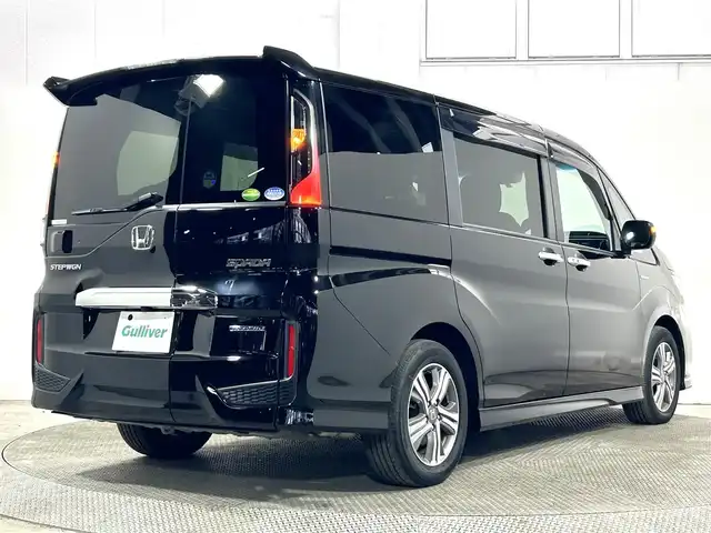 ホンダ ステップワゴン スパーダ eHEV G EXホンダS 大阪府 2020(令2)年 1.1万km プレミアムスパークルブラックパール 純正９ｉｎｃナビ（フルセグ／ＤＶＤ再生／Ｂｌｕｅｔｏｏｔｈ）　バックカメラ　ＥＴＣ　両側パワースライドドア　衝突軽減　レーダークルコン　レーンアシスト　ハーフレザー　シートヒーター　前後ドラレコ