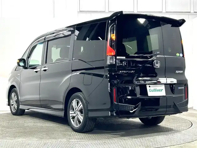 ホンダ ステップワゴン スパーダ eHEV G EXホンダS 大阪府 2020(令2)年 1.1万km プレミアムスパークルブラックパール 純正９ｉｎｃナビ（フルセグ／ＤＶＤ再生／Ｂｌｕｅｔｏｏｔｈ）　バックカメラ　ＥＴＣ　両側パワースライドドア　衝突軽減　レーダークルコン　レーンアシスト　ハーフレザー　シートヒーター　前後ドラレコ
