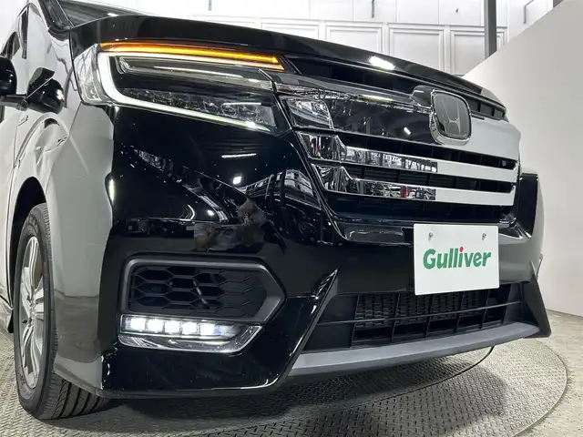 ホンダ ステップワゴン スパーダ eHEV G EXホンダS 大阪府 2020(令2)年 1.1万km プレミアムスパークルブラックパール 純正９ｉｎｃナビ（フルセグ／ＤＶＤ再生／Ｂｌｕｅｔｏｏｔｈ）　バックカメラ　ＥＴＣ　両側パワースライドドア　衝突軽減　レーダークルコン　レーンアシスト　ハーフレザー　シートヒーター　前後ドラレコ