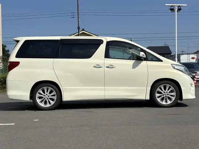 トヨタ アルファード 350S Cパッケージ 東京都 2009(平21)年 12万km ゴールドパールクリスタルシャイン ナビ/バック/サイドカメラ/ETC/ドラレコ/クリアランスソナー/バックソナー/クルーズコントロール/パワースライドドア（運転席側/助手席側）/パワーバックドア/車名ロゴ入スカッフプレート/スモーク加飾付HIDヘッドランンプ/インテリジェントAFS /コンライト（オートライト）/サイドクラッディングパネル/リアスポイラー/リアエアロバンパー/スモークレンズLEDリアコンビネーションランプ/マフラーカッター/リバース連動機能付ボディ同色電動オート格納ドアミラー/ウィンカーミラー/照射証明付ブルー指針オプティトロンメーター（自発光式アナログメーター）/SRSエアバッグ（運転席/助手席/サイド/カーテン/ニー)/左右独立温度調整オートエアコン/リアオートエアコン/内外気自動切替システム/プラズマクラスター/足元照明（運転席/助手席）/オーバーヘッドコンソール/パワーシート（運転席/助手席）/パワーオットマン（助手席）/マイコンプリセットドライビングポジションシステム/2列目シートエグゼクティブパワーシート/パワーオットマン/パワーリクライニング/カップホルダー付大型アームレスト/角度調整式大型ヘッドレスト