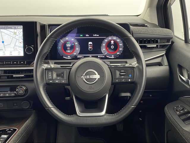 日産 オーラ G 栃木県 2022(令4)年 2万km バーガンディー メーカー9インチナビ/（BT/TV/USB/AM/FM）/BOSEサウンド/プロパイロット/車線逸脱防止支援/後側方衝突防止支援/エマージェンシーブレーキ/速度標識表示/ルート減速支援/制限速度支援/後退時車両検知警報/ふらつき防止/ETC2.0/ドライブレコーダー/置くだけ充電/インテリジェントルームミラー/360度カメラ/バック・サイド・フロントカメラ/ステアリングヒーター/純正17インチアルミホイール/純正フロアマット/サイド+カーテンエアバッグ/スマートキー×1本