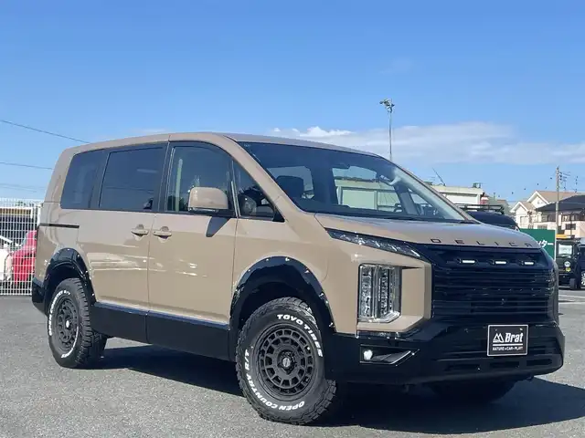 三菱 デリカＤ：５ G パワーパッケージ 千葉県 2022(令4)年 3.1万km 茶 AIS検査済み/【2508013513】社外パーツ取り付け済み/全塗装　/ＪＡＯＳフロントグリル／オーバーフェンダー　（社外）/ＴＯＹＯオープンカントリーＲ／Ｔ新品タイヤ　（社外）/ＷＥＤＳマッドヴァンスＸ新品アルミ　（社外）/ボンネットエンブレム　/純正10.1インチナビ　/全方位カメラ　/オートサイドステップ/両側パワースライドドア/パワーバックドア/前席シートヒーター/ステアリングヒーター/パドルシフト