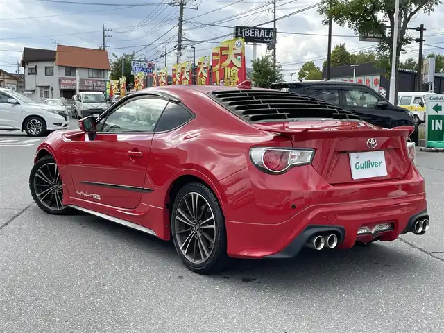 トヨタ ８６ GT リミテッド 長野県 2015(平27)年 4.5万km ピュアレッド 純正SDナビ/・Bluetooth/フルセグTV/DVD/CD/パドルシフト/クルーズコントロール追従無し/バックカメラ/純正フロアマット/ハーフレザーシート/シートヒーターD+N席/リアガラス　エアロ装着（メーカ　TRD）/純正17インチAW/スタッドレスタイヤ/コーナーセンサー前後/LEDオートヘッドライト/フォグランプ/スポーツモード/スノーモード/Wエアバック/カーテンエアバック/冷房AAC/スマートキー/スペアキー1本