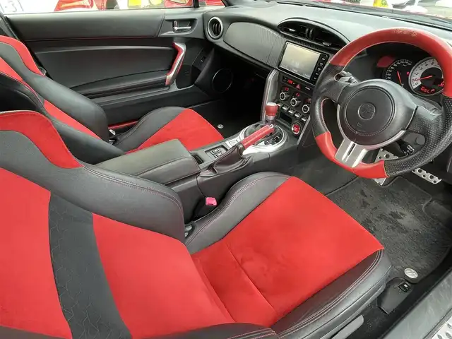 トヨタ ８６ GT リミテッド 長野県 2015(平27)年 4.5万km ピュアレッド 純正SDナビ/・Bluetooth/フルセグTV/DVD/CD/パドルシフト/クルーズコントロール追従無し/バックカメラ/純正フロアマット/ハーフレザーシート/シートヒーターD+N席/リアガラス　エアロ装着（メーカ　TRD）/純正17インチAW/スタッドレスタイヤ/コーナーセンサー前後/LEDオートヘッドライト/フォグランプ/スポーツモード/スノーモード/Wエアバック/カーテンエアバック/冷房AAC/スマートキー/スペアキー1本