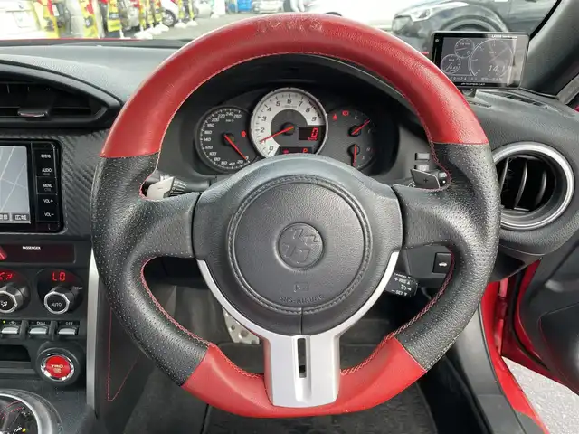 トヨタ ８６ GT リミテッド 長野県 2015(平27)年 4.5万km ピュアレッド 純正SDナビ/・Bluetooth/フルセグTV/DVD/CD/パドルシフト/クルーズコントロール追従無し/バックカメラ/純正フロアマット/ハーフレザーシート/シートヒーターD+N席/リアガラス　エアロ装着（メーカ　TRD）/純正17インチAW/スタッドレスタイヤ/コーナーセンサー前後/LEDオートヘッドライト/フォグランプ/スポーツモード/スノーモード/Wエアバック/カーテンエアバック/冷房AAC/スマートキー/スペアキー1本