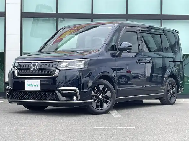 ホンダ ステップワゴン スパーダ eHEV 和歌山県 2024(令6)年 0.6万km ミッドナイトブルービームM 純正11.4インチナビ/バックカメラ/フルセグTV/衝突軽減ブレーキ/ブラインドスポットモニター/レーダークルコン/前後コーナーセンサー/オートライト/横滑り防止/ビルトインETC/両側パワスラ/シートヒーター/電動リアゲート/パドルシフト/ステリモ/オートホールド/LEDヘッドライト/フォグランプ/オットマン/後席サンシェード
