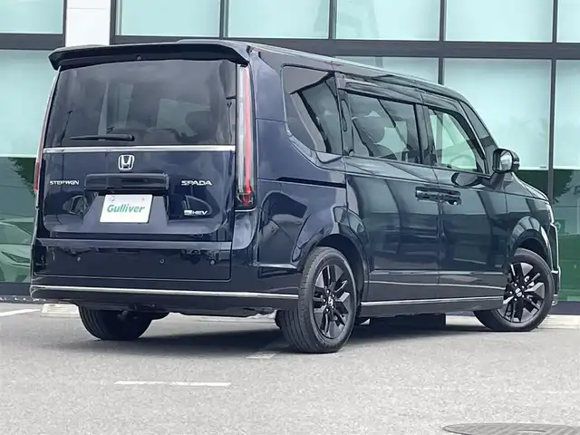 ホンダ ステップワゴン スパーダ eHEV 和歌山県 2024(令6)年 0.6万km ミッドナイトブルービームM 純正11.4インチナビ/バックカメラ/フルセグTV/衝突軽減ブレーキ/ブラインドスポットモニター/レーダークルコン/前後コーナーセンサー/オートライト/横滑り防止/ビルトインETC/両側パワスラ/シートヒーター/電動リアゲート/パドルシフト/ステリモ/オートホールド/LEDヘッドライト/フォグランプ/オットマン/後席サンシェード