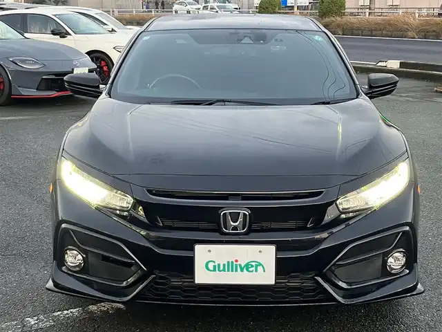 ホンダ シビック ハッチバック 三重県 2020(令2)年 1.5万km クリスタルブラックパール ワンオーナー /登録時走行距離14721km/♪ホンダセンシング/ ・衝突軽減ブレーキ(CMBS)・車線維持支援システム(LKAS)/ ・歩行者事故低減ステアリング・路外逸脱抑制機能/ ・先行車発進お知らせ機能・オートハイビーム/ ・アダプティブクルーズコントロール(ACC)/♪純正ナビ/ ・フルセグ・DVD再生/ ・BTオーディオ・SD録音/♪バックカメラ/♪ハーフレザーシート/♪前席シートヒーター/♪前席パワーシート/♪スマートキー/♪プッシュスタート/♪ドライブレコーダー(前後)/♪オートブレーキホールド/♪LEDヘッドライト/♪LEDフォグライト /♪オートライト/♪純正18インチAW/♪革巻きステアリング/♪パドルシフト/♪ステアリングスイッチ/♪ウィンカーミラー/♪ビルトインETC2.0/♪フロアマット/♪ドアバイザー/♪プライバシーガラス/♪電格ミラー
