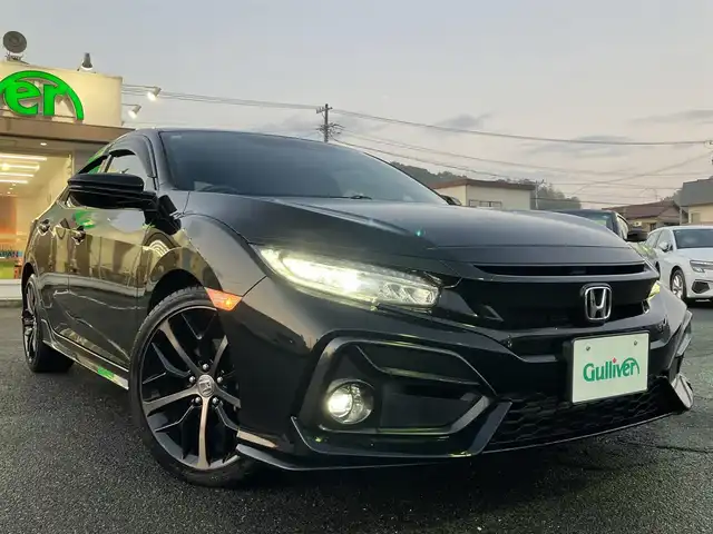 ホンダ シビック ハッチバック 三重県 2020(令2)年 1.5万km クリスタルブラックパール ワンオーナー /登録時走行距離14721km/♪ホンダセンシング/ ・衝突軽減ブレーキ(CMBS)・車線維持支援システム(LKAS)/ ・歩行者事故低減ステアリング・路外逸脱抑制機能/ ・先行車発進お知らせ機能・オートハイビーム/ ・アダプティブクルーズコントロール(ACC)/♪純正ナビ/ ・フルセグ・DVD再生/ ・BTオーディオ・SD録音/♪バックカメラ/♪ハーフレザーシート/♪前席シートヒーター/♪前席パワーシート/♪スマートキー/♪プッシュスタート/♪ドライブレコーダー(前後)/♪オートブレーキホールド/♪LEDヘッドライト/♪LEDフォグライト /♪オートライト/♪純正18インチAW/♪革巻きステアリング/♪パドルシフト/♪ステアリングスイッチ/♪ウィンカーミラー/♪ビルトインETC2.0/♪フロアマット/♪ドアバイザー/♪プライバシーガラス/♪電格ミラー