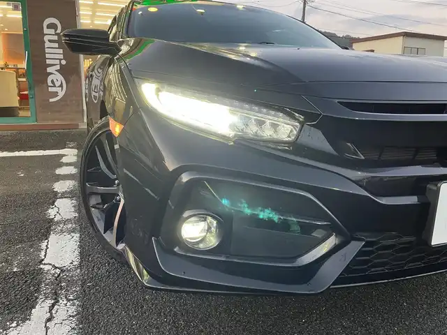 ホンダ シビック ハッチバック 三重県 2020(令2)年 1.5万km クリスタルブラックパール ワンオーナー /登録時走行距離14721km/♪ホンダセンシング/ ・衝突軽減ブレーキ(CMBS)・車線維持支援システム(LKAS)/ ・歩行者事故低減ステアリング・路外逸脱抑制機能/ ・先行車発進お知らせ機能・オートハイビーム/ ・アダプティブクルーズコントロール(ACC)/♪純正ナビ/ ・フルセグ・DVD再生/ ・BTオーディオ・SD録音/♪バックカメラ/♪ハーフレザーシート/♪前席シートヒーター/♪前席パワーシート/♪スマートキー/♪プッシュスタート/♪ドライブレコーダー(前後)/♪オートブレーキホールド/♪LEDヘッドライト/♪LEDフォグライト /♪オートライト/♪純正18インチAW/♪革巻きステアリング/♪パドルシフト/♪ステアリングスイッチ/♪ウィンカーミラー/♪ビルトインETC2.0/♪フロアマット/♪ドアバイザー/♪プライバシーガラス/♪電格ミラー
