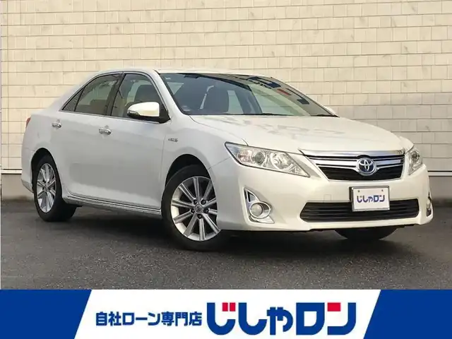 トヨタ カムリ ハイブリット レザーパッケージ 栃木県 2012(平24)年 8.4万km ホワイトパールクリスタルシャイン (株)IDOMが運営する【じしゃロン小山店】の自社ローン対象車両になります。こちらは現金ご利用時の価格です。/自社ローンご希望の方は別途その旨お申付け下さい。//禁煙車/純正フルセグナビ/（CD/DVD/AM/FMラジオ）/(Bluetooth)/スマートキー/プッシュスタート/バックカメラ/ＥＴＣ/クルーズコントロール/ドライブレコーダー/パワーシート/シートヒーター/ステアリングリモコン/電動格納ドアミラー/パワーウインドウ/オートライト/自動防眩ミラー
