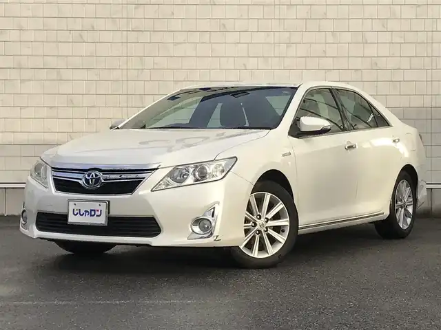 トヨタ カムリ ハイブリット レザーパッケージ 栃木県 2012(平24)年 8.4万km ホワイトパールクリスタルシャイン (株)IDOMが運営する【じしゃロン小山店】の自社ローン対象車両になります。こちらは現金ご利用時の価格です。/自社ローンご希望の方は別途その旨お申付け下さい。//禁煙車/純正フルセグナビ/（CD/DVD/AM/FMラジオ）/(Bluetooth)/スマートキー/プッシュスタート/バックカメラ/ＥＴＣ/クルーズコントロール/ドライブレコーダー/パワーシート/シートヒーター/ステアリングリモコン/電動格納ドアミラー/パワーウインドウ/オートライト/自動防眩ミラー