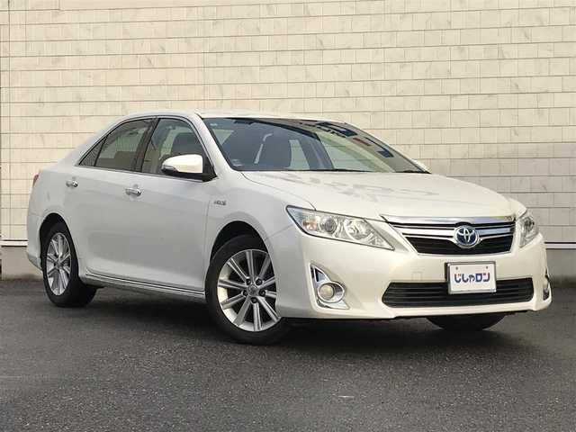 トヨタ カムリ ハイブリット レザーパッケージ 栃木県 2012(平24)年 8.4万km ホワイトパールクリスタルシャイン (株)IDOMが運営する【じしゃロン小山店】の自社ローン対象車両になります。こちらは現金ご利用時の価格です。/自社ローンご希望の方は別途その旨お申付け下さい。//禁煙車/純正フルセグナビ/（CD/DVD/AM/FMラジオ）/(Bluetooth)/スマートキー/プッシュスタート/バックカメラ/ＥＴＣ/クルーズコントロール/ドライブレコーダー/パワーシート/シートヒーター/ステアリングリモコン/電動格納ドアミラー/パワーウインドウ/オートライト/自動防眩ミラー