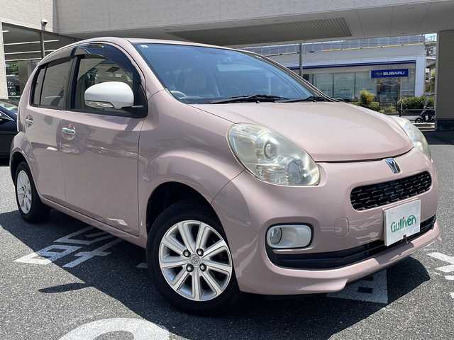 トヨタ パッソ プラスハナ 広島県 2015(平27)年 6.1万km ムースピンクP /登録時走行距離/　　　　　　　60341キロ/ワンオーナー/アイドリングストップ/純正ナビ/バックカメラ/地デジ/スペアキー×１/ETC/新車時整備手帳/　　【保証書】/取扱説明書/