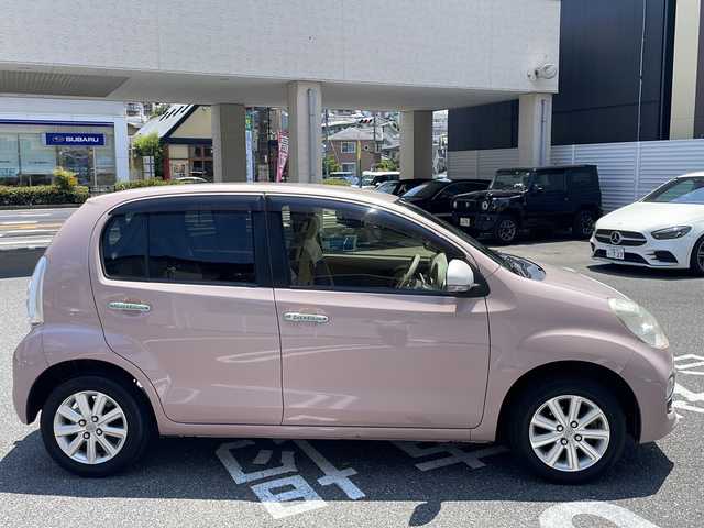 トヨタ パッソ プラスハナ 広島県 2015(平27)年 6.1万km ムースピンクP /登録時走行距離/　　　　　　　60341キロ/ワンオーナー/アイドリングストップ/純正ナビ/バックカメラ/地デジ/スペアキー×１/ETC/新車時整備手帳/　　【保証書】/取扱説明書/