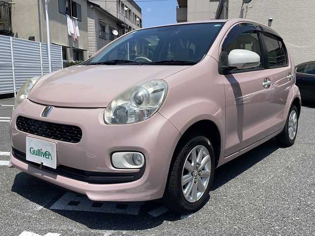 トヨタ パッソ プラスハナ 広島県 2015(平27)年 6.1万km ムースピンクP /登録時走行距離/　　　　　　　60341キロ/ワンオーナー/アイドリングストップ/純正ナビ/バックカメラ/地デジ/スペアキー×１/ETC/新車時整備手帳/　　【保証書】/取扱説明書/