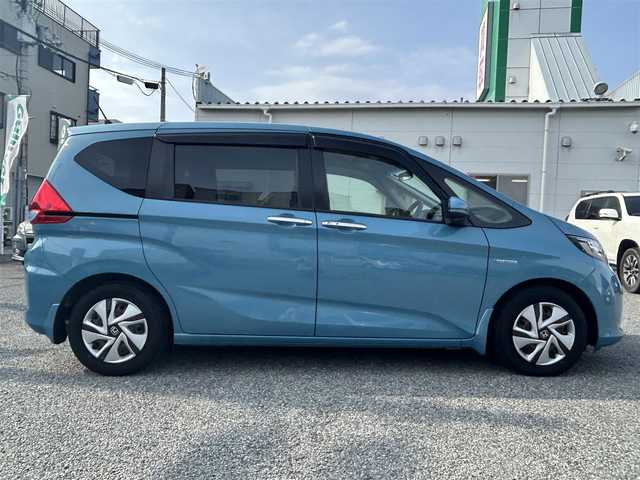 ホンダ フリード ハイブリット G ホンダセンシング 兵庫県 2017(平29)年 8.4万km ブルーホライゾンM ・純正9インチメモリーナビ/・地デジ/DVD/・バックカメラ/・ステアリングリモコン/・両側パワースライドドア/・ビルトインETC/・オートLEDヘッドランプ/・CMBS警報/・アダプティブクルーズコントロール/・先行車発進お知らせ/・路外逸脱抑制制御/・レーンキープアシストシステム/・標識認識機能