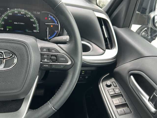 トヨタ ヴォクシー ハイブリッド S－Z 千葉県 2023(令5)年 2.1万km ホワイトパールクリスタルシャイン 1オーナー 10.5型ナビ フルセグ DVD フリップダウンモニター 快適利便パック 電動リアドア 両側電動スライドドア シートヒーター ステアヒーター 2.0ETC ドラレコ AC100V LED