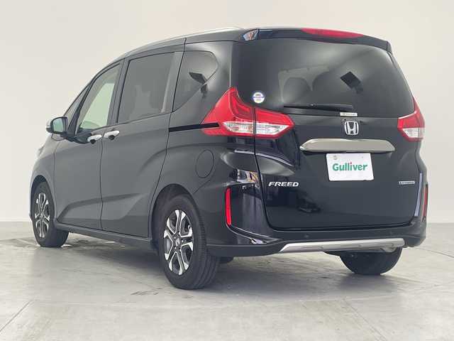 ホンダ フリード ハイブリット クロスター 愛知県 2023(令5)年 1.8万km クリスタルブラックパール 純正ナビ/・Bluetooth/・CD/バックカメラ/両側パワースライドドア/ホンダセンシング/・衝突軽減システム/・レーンキープアシスト/・コーナーセンサー（リア）/・レーダークルーズコントロール/運転席/助手席シートヒーター/電動格納ミラー/ETC/LEDアクティブコーナリングライト/LEDフォグライト