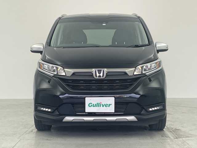 ホンダ フリード ハイブリット クロスター 愛知県 2023(令5)年 1.8万km クリスタルブラックパール 純正ナビ/・Bluetooth/・CD/バックカメラ/両側パワースライドドア/ホンダセンシング/・衝突軽減システム/・レーンキープアシスト/・コーナーセンサー（リア）/・レーダークルーズコントロール/運転席/助手席シートヒーター/電動格納ミラー/ETC/LEDアクティブコーナリングライト/LEDフォグライト