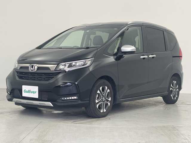 ホンダ フリード ハイブリット クロスター 愛知県 2023(令5)年 1.8万km クリスタルブラックパール 純正ナビ/・Bluetooth/・CD/バックカメラ/両側パワースライドドア/ホンダセンシング/・衝突軽減システム/・レーンキープアシスト/・コーナーセンサー（リア）/・レーダークルーズコントロール/運転席/助手席シートヒーター/電動格納ミラー/ETC/LEDアクティブコーナリングライト/LEDフォグライト