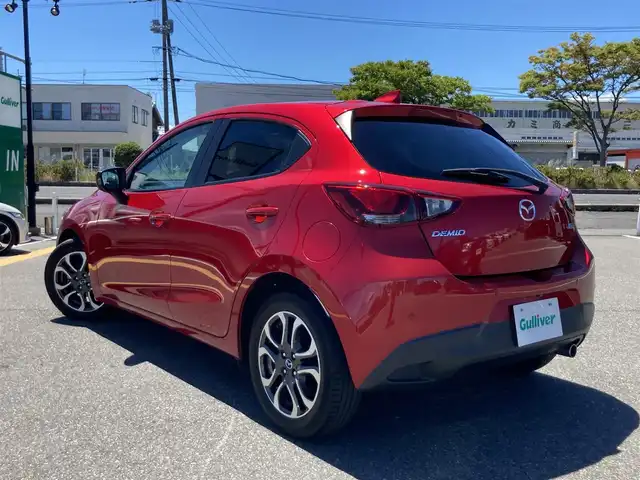マツダ デミオ XD ツーリング 鳥取県 2015(平27)年 7.5万km ソウルレッドプレミアムメタリック ディーゼル・ターボ車/純正ナビ/BT/USB/バックカメラ/フロントブラインドカメラ/ETC/ドライブレコーダー/衝突被害軽減システム/前後コーナーセンサー/クルーズコントロール/ヘットアップディスプレイ/社外ボンネットダンパー(AutoExe)/LEDヘットライト/純正16インチアルミホイール/プッシュエンジンスタート/アイドリングストップ/スペアキー