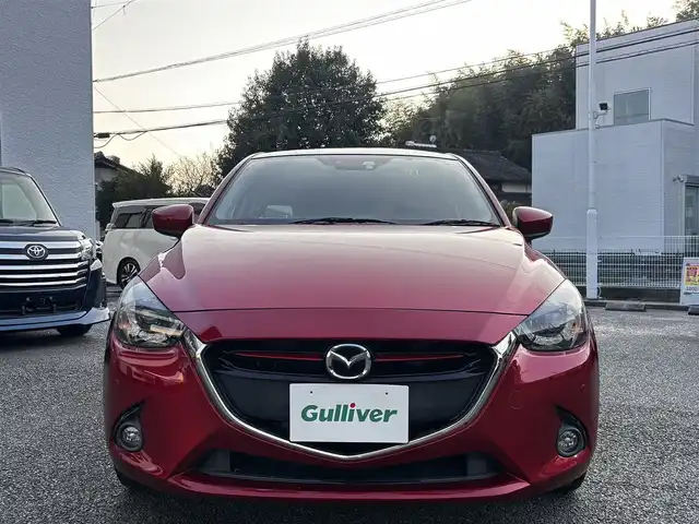 マツダ デミオ XD ツーリング 熊本県 2015(平27)年 7.5万km ソウルレッドプレミアムメタリック 純正ナビ/【Bluetooth/USB】/バックカメラ/フロントカメラ/衝突軽減システム/ヘッドアップディスプレイ/ステアリングスイッチ/クルーズコントロール/M/Tモード/アイドリングストップ/コーナーセンサー/LEDヘッドライト/ETC/ドライブレコーダー/社外ボンネットダンパー(AutoExe)/純正16インチアルミホイール/プッシュスタート/取扱説明書/保証書