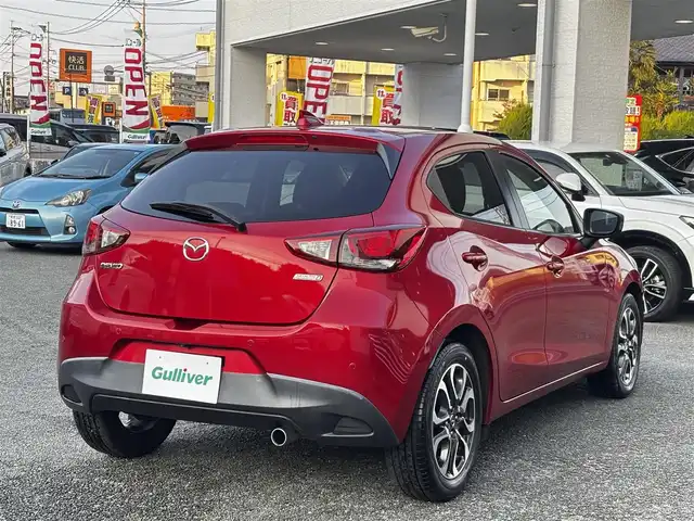 マツダ デミオ XD ツーリング 熊本県 2015(平27)年 7.5万km ソウルレッドプレミアムメタリック 純正ナビ/【Bluetooth/USB】/バックカメラ/フロントカメラ/衝突軽減システム/ヘッドアップディスプレイ/ステアリングスイッチ/クルーズコントロール/M/Tモード/アイドリングストップ/コーナーセンサー/LEDヘッドライト/ETC/ドライブレコーダー/社外ボンネットダンパー(AutoExe)/純正16インチアルミホイール/プッシュスタート/取扱説明書/保証書