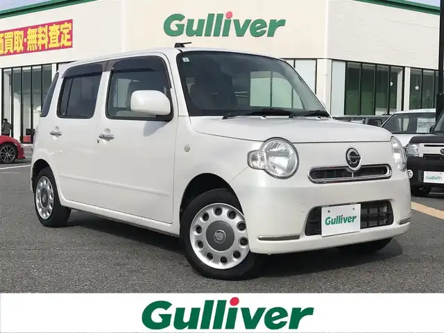 ダイハツ ミラ ココア X 鳥取県 2013(平25)年 9.4万km パールホワイトⅢ ４・W・D/純正CDオーディオ/AM/FM/AUX/アイドリングストップ/電動格納ミラー/ハロゲンヘットライト/純正ホイールキャップ/オートエアコン/ベンチシート/フロアマット/ドアバイザー/スマートキー/スペアキー