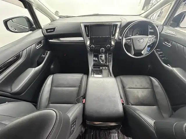トヨタ アルファード S Cパッケージ 道央・札幌 2018(平30)年 3.5万km ブラック ・4WD/・ディーラーオプション9インチナビ/・フルセグTV/・両側パワースライドドア/・バックモニター/・ETC/・フリップダウンモニター/・セーフティセンス/・プリクラッシュセーフティ/・レーダークルーズコントロール/・オートマチックハイビーム/・レーントレーシングアシスト/・LEDヘッドランプ/・純正18インチアルミホイール/・革巻きステアリングホイール/・ステアリングヒーター/・ブラック合皮シート/・快適温熱シート/・パワーシート/・助手席パワーオットマン/・２列目エグゼグティブパワーシート/・サンシェード/・ウエルカムパワースライドドア機能付スマートエントリー/・SRSエアバック（運転席・助手席・サイド・カーテン）