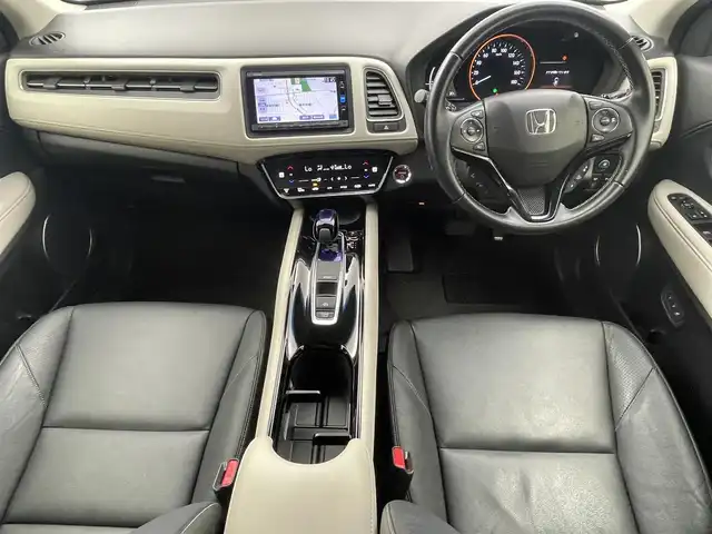 ホンダ ヴェゼル ハイブリッド Z ホンダセンシング 茨城県 2016(平28)年 4.9万km ホワイトオーキッドパール 純正ナビ［VXM-164VFi］/ワンセグ再生可/Honda SENSING/・衝突軽減ブレーキ/・誤発進抑制機能/・歩行者事故軽減ステアリング/・路外逸脱抑制機能/・アダプティブクルーズコントロール/・車線維持支援システム/・先行車発進お知らせシステム/・標識認識機能/レザーシート/シートヒーター/純正アルミホイール/純正フロアマット/ビルトインETC