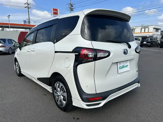 トヨタ シエンタ ハイブリッド G クエロ 岡山県 2019(平31)年 4.4万km ホワイトパールクリスタルシャイン 登録時走行距離43758km/ワンオーナー/TRDフルエアロ/純正9インチナビ/フルセグTV(AM/FM/CD/DVD/TV/BT)/パノラミックビューモニター/両側パワースライドドア/ビルトインETC/ドライブレコーダー/トヨタセーフティセンス/・プリクラッシュセーフティ/・レーンキープアシスト/・クルーズコントロール/・オートマチックハイビーム/横滑り防止装置/アイドリングストップ/LEDヘッドライト/フォグランプ/純正ホイール（スタッドレス）/純正フロアマット/ユピテルレーダー探知機