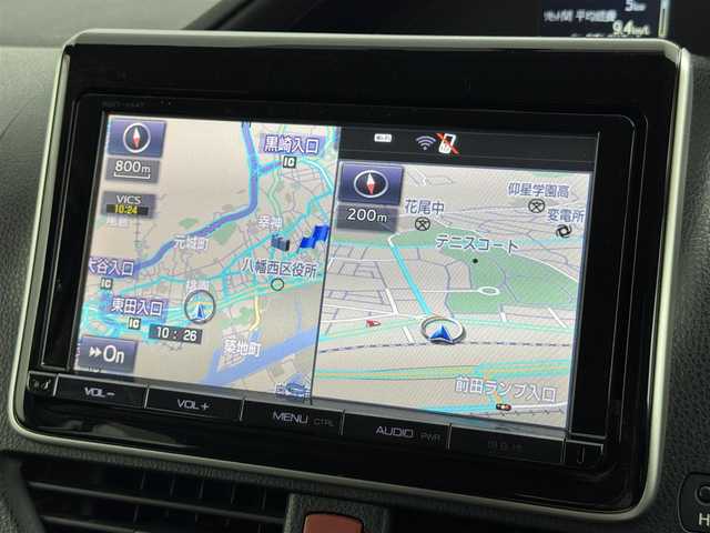 トヨタ ノア Si 福岡県 2015(平27)年 9.8万km ホワイトパールクリスタルシャイン フリップダウンモニター　/純正ナビ（ＢＴ，フルセグＴＶ）　/バックカメラ　/ビルトインＥＴＣ　/衝突軽減ブレーキ　/レーンキープ　/アイドリングストップ　/方側電動スライドドア　/ＭＴモード付き　/純正１６インチＡＷ