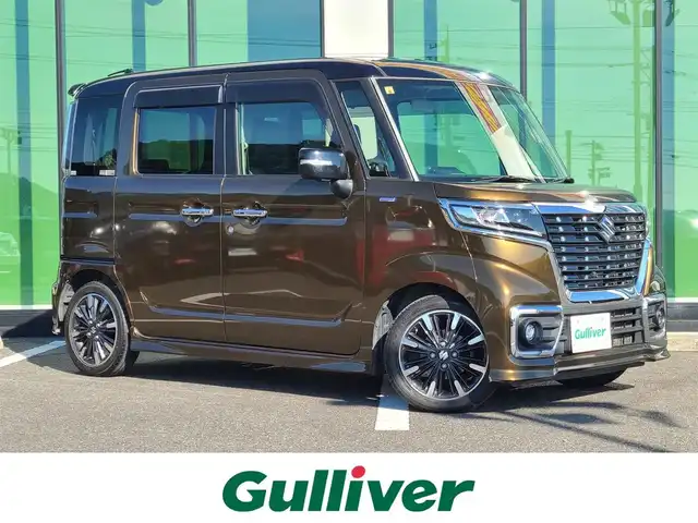 スズキ スペーシア カスタム HYBRID XS 福岡県 2018(平30)年 9.8万km ブレイブカーキパール/ブラック2トーン 純正７インチナビ/Bluetooth/フルセグＴＶ/ＣＤ／ＤＶＤ再生機能有/全周囲カメラ/ステアリングリモコン/ＥＴＣ/両側パワースライドドア/ハーフレザーシート/シートヒーター/ＨＵＤ/純正１５インチアルミホイール/純正フロアマット/レーダーブレーキサポート/コーナーセンサー/サイドバイザー/スペアキー