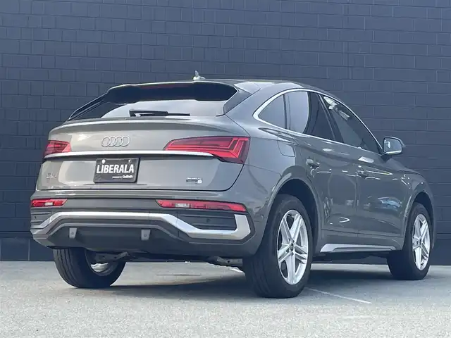 アウディ アウディ Ｑ５ SB 40TDIクワトロ Sライン 三重県 2023(令5)年 1.9万km グレー ACC/衝突軽減B/アクティブレーンアシスト/パノラマサンルーフ/バーチャルコックピット/純正ナビ/全方位カメラ/フルセグTVチューナー/AppleCarPlay/AndroidAuto/アンビエントライト/アウディドライブセレクト/シートヒーター/純正19インチアルミ/・Sラインプラスパッケージ/アーティフィシャルインテリアレザー/全席シートヒーター/アコースティックガラス/・コンフォートパッケージ/ワイヤレスチャージ/リヤシートUSBチャージング/ステアリングヒーター/純正前後ドラレコ