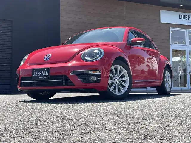 フォルクスワーゲン ザ・ビートル デザインマイスター 宮崎県 2018(平30)年 4.9万km 赤 ブラインドスポットモニター/純正SDナビ/・CD/・DVD/・Bluetooth /・フルセグTV/・AM/・FM/・USB/バックカメラ/ETC/革巻きステアリング/ステアリングリモコン/パドルシフト/クルーズコントロール/純正HIDヘッドライト/フォグランプ/オートライト/純正フロアマット/純正17インチアルミ