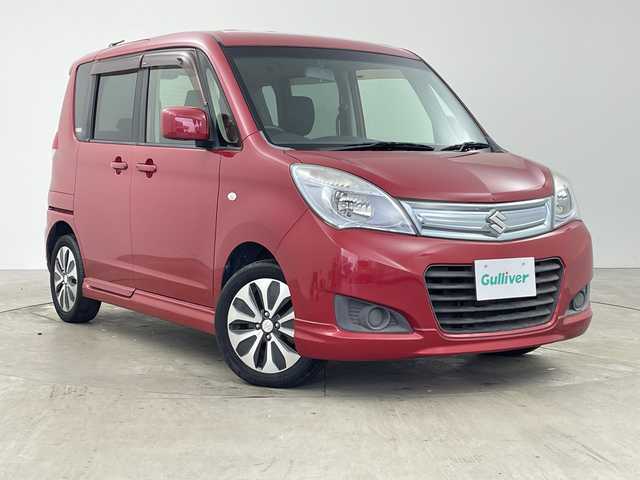 スズキ ソリオ X DJE 兵庫県 2013(平25)年 6.1万km フェニックスレッドパール ・社外ナビ＆BT＆DVD/・左側パワースライドドア/・右側イージークローザードア/・スマートキー/・プッシュスタート/・アイドリングストップ/・横滑り防止装置/・シートバックテーブル/・純正15インチアルミホイール/・電動格納ミラー/・純正フロアマット/・ハロゲンライト