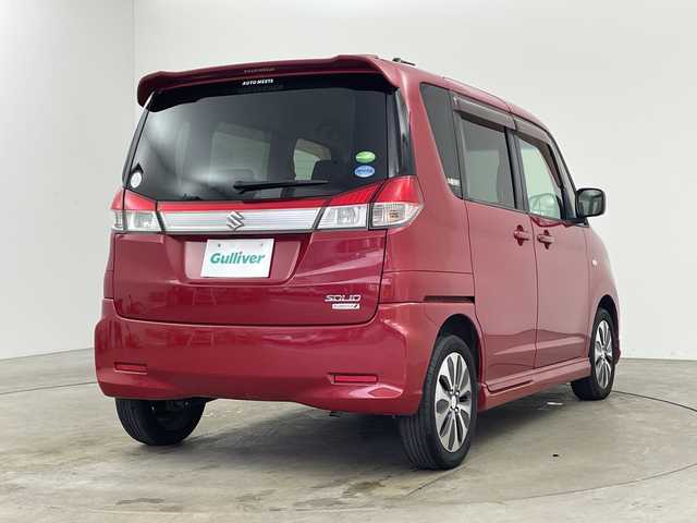 スズキ ソリオ X DJE 兵庫県 2013(平25)年 6.1万km フェニックスレッドパール ・社外ナビ＆BT＆DVD/・左側パワースライドドア/・右側イージークローザードア/・スマートキー/・プッシュスタート/・アイドリングストップ/・横滑り防止装置/・シートバックテーブル/・純正15インチアルミホイール/・電動格納ミラー/・純正フロアマット/・ハロゲンライト