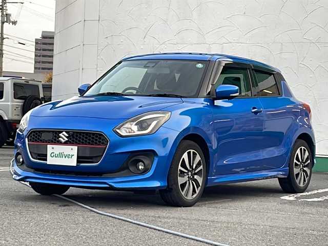 スズキ スイフト HYBRID RS 徳島県 2018(平30)年 3.9万km スピーディーブルーM セーフティパッケージ/デュアルセンサーブレーキサポート/レーダークルーズコントロール/レーンキープアシスト/横滑り防止装置/全周囲モニター用カメラ装着車/純正8型ナビ/（Bluetooth/フルセグ/CD/DVD/SD）/パドルシフト/シートヒーター/ドライブレコーダー/ビルトインETC/純正フロアマット/LEDヘッドライト