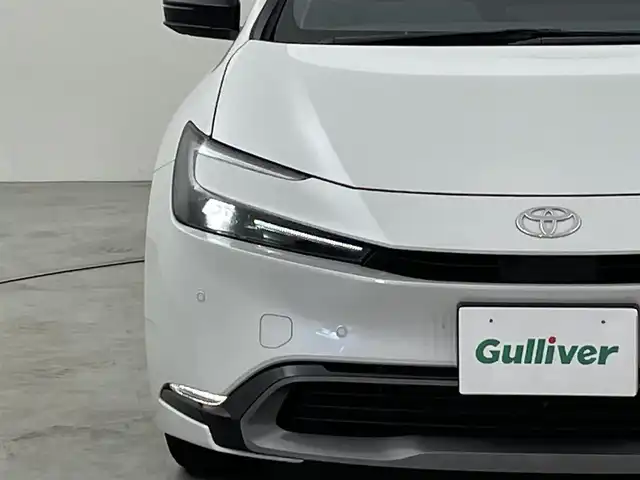 トヨタ プリウス Z 福岡県 2024(令6)年 0.7万km プラチナホワイトパールマイカ 純正１２．３型ナビ　/全方位カメラ　/ＥＴＣ２．０　/レーダー探知機　/置くだけ充電　/デジタルルームミラー　/ＡＣＣ　/コーナーセンサー　/ＰＣＳ　/ＬＤＡ　/ＢＳＭ　/ＲＣＴＡ　/パーキングアシスト　/ステアリングヒーター