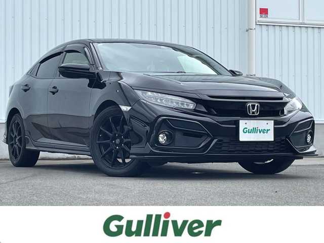 ホンダ シビック ハッチバック 愛媛県 2021(令3)年 6.9万km クリスタルブラックパール 純正ナビ/（BT/CD/DVD/USB/フルセグTV）/バックカメラ/ETC2.0/アダプティブクルーズコントロール/黒ハーフレザーシート/LEDヘッドライト/前席パワーシート/前席シートヒーター/オートブレーキホールド/電動サイドブレーキ/革巻きステアリング/ステアリングスイッチ/プッシュスタート/スマートキー/社外17インチアルミホイール/積込純正AW付サマータイヤ