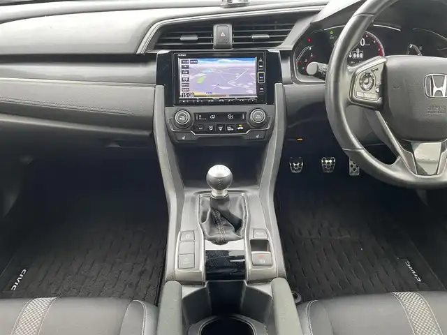 ホンダ シビック ハッチバック 愛媛県 2021(令3)年 6.9万km クリスタルブラックパール 純正ナビ/（BT/CD/DVD/USB/フルセグTV）/バックカメラ/ETC2.0/アダプティブクルーズコントロール/黒ハーフレザーシート/LEDヘッドライト/前席パワーシート/前席シートヒーター/オートブレーキホールド/電動サイドブレーキ/革巻きステアリング/ステアリングスイッチ/プッシュスタート/スマートキー/社外17インチアルミホイール/積込純正AW付サマータイヤ