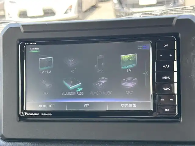 スズキ ジムニー XC 岡山県 2019(令1)年 6.1万km ジャングルグリーン 登録時走行距離60829km/社外ナビ/フルセグTV/(AM.FM.TV.CD.DVD.BT)/バックカメラ/ETC/衝突軽減ブレーキ/ドライブレコーダー/レーンキープアシスト/クルーズコントロール/横滑り防止装置/オートマチックハイビーム/アイドリングストップ/カーテンエアバック/シートヒーター(D+N席)/16インチ純正AW/プッシュスタート/ルーフレール